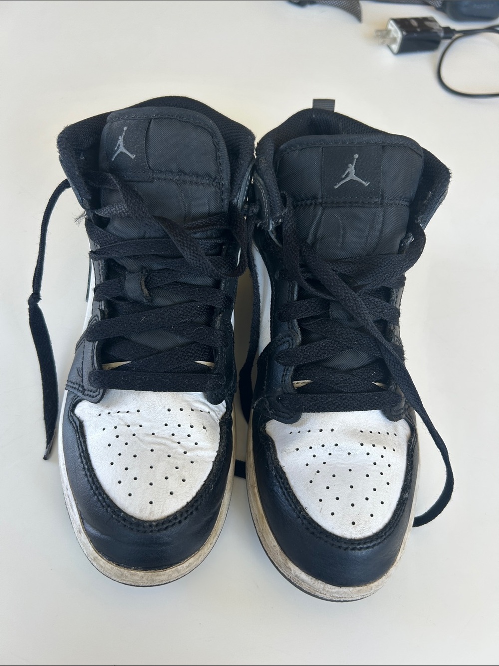 Jordan Kids Black and White High-Top Sneakers with Jumpman